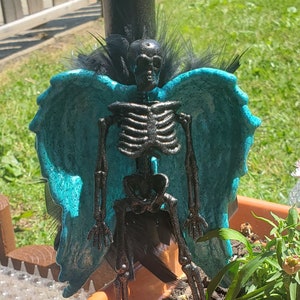 Blue and Black Skeleton Angel