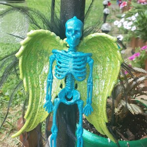 Blue and Green Skeleton Angel