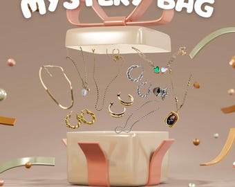 May include: A pink and white gift box with a bow on top. The box is open and there are various gold and silver necklaces, earrings, and pendants inside. The text "MYSTERY BAG" is above the box and the text "ONE SURPRISE ITEM!" is below the box.