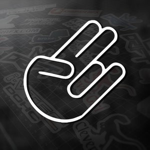May include: White outline of a hand gesture, showing the thumb, index, and middle fingers extended. The hand is set against a dark background with various sticker designs. The gesture is a symbol of the car culture.