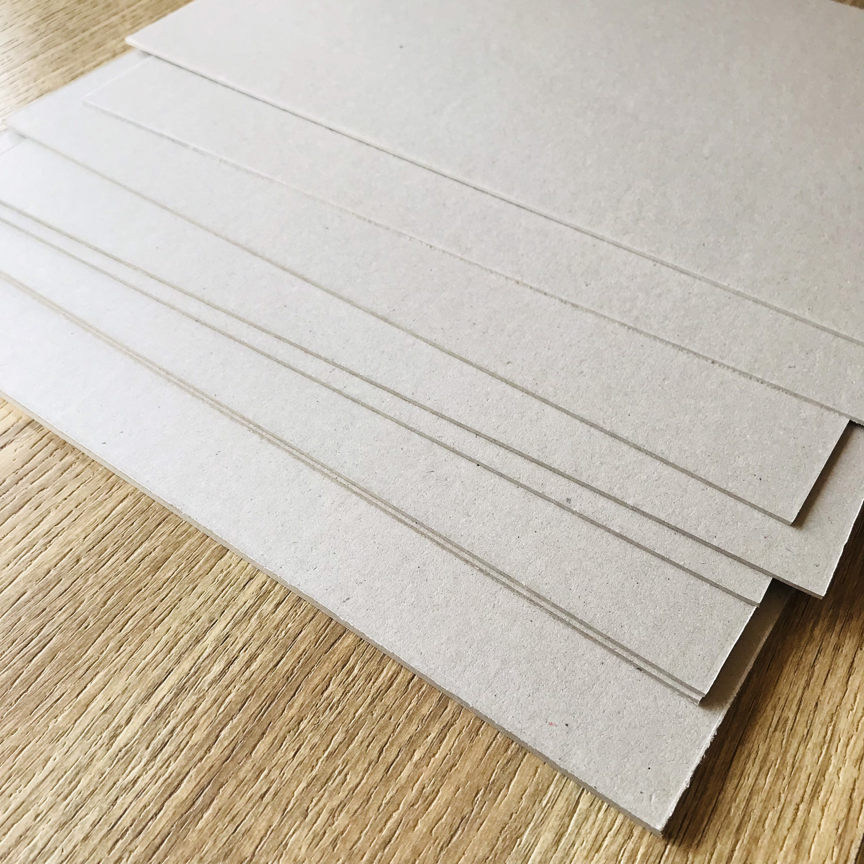1.5mm 2mm 2.5mm Laminated Chip Board Grey Cardboard with Round Corner for  Puzzle