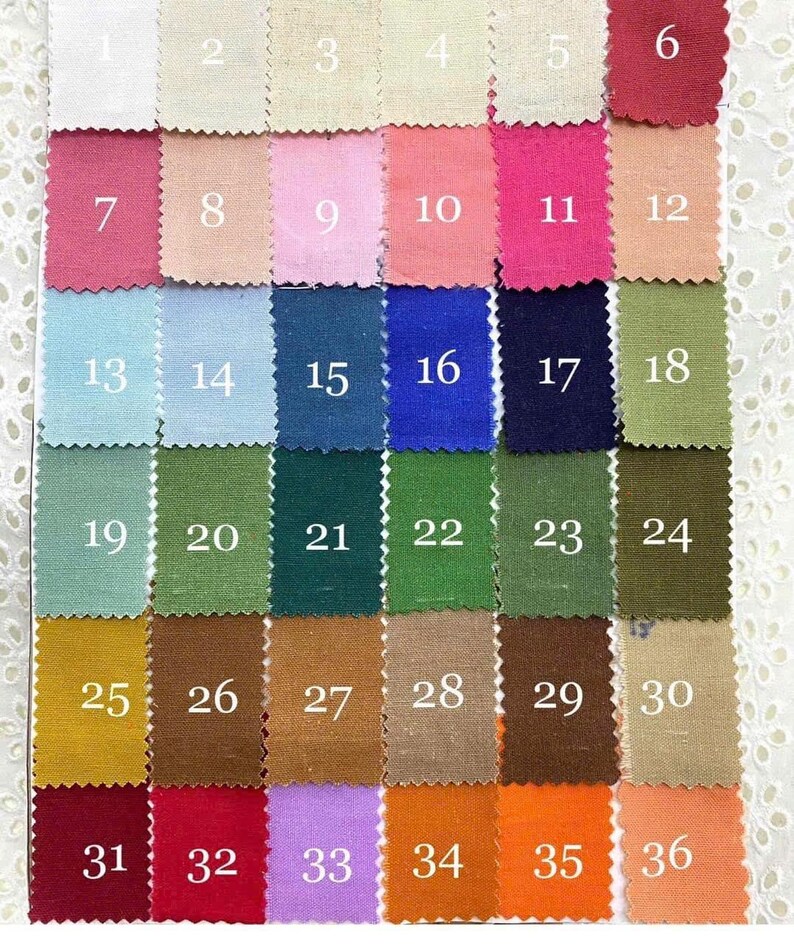 Puede incluir: Una carta de colores con 36 muestras de tela, numeradas del 1 al 36. Las muestras est&aacute;n dispuestas en una cuadr&iacute;cula de seis filas y seis columnas. Las muestras son de varios colores, incluyendo blanco, beige, rosa, rojo, azul, verde, marr&oacute;n y amarillo.