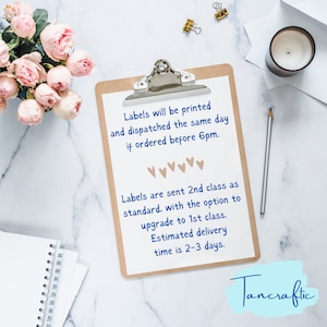 May include: A clipboard with a white sheet of paper with blue text that reads "Labels will be printed and dispatched the same day if ordered before 6pm. Labels are sent 2nd class as standard. with the option to upgrade to 1st class. Estimated delivery time is 2-3 days." The text "TANCRAFTIC" is written in blue cursive at the bottom of the page.