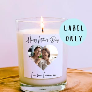 May include: White candle with a label that says "Happy Mother's Day" and features a heart-shaped photo of two women. The label also says "Love from Lauren xx".