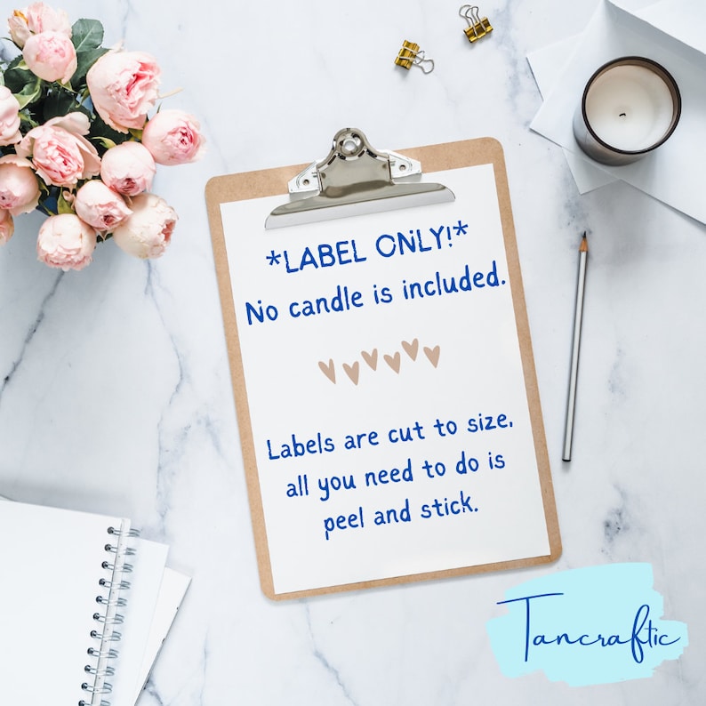 May include: A clipboard with a white paper that has text in blue and brown. The text says "*LABEL ONLY!* No candle is included. Labels are cut to size, all you need to do is peel and stick."