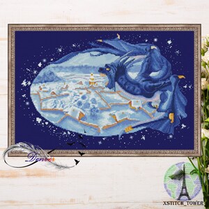 May include: A blue dragon with wings spread wide, flying over a snowy landscape with a starry night sky in the background. The dragon is facing the viewer with its mouth open, showing sharp teeth.