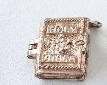 Sterling silver charm.Just the bible left. reduced to 15 pounds. CH42