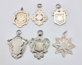 3 left: antique vintage sterling silver watch fobs. Priced and sold individually. GR/1755