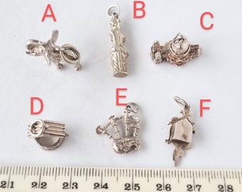 2 vintage 1960s/70s sterling silver charms, individually priced. CH16