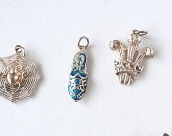3 Vintage silver charms, some marked, sold individually but all same price. CH29.