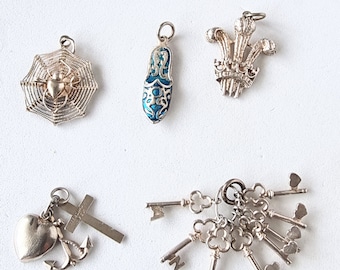Vintage silver charms, some marked, sold individually but all same price. CH29.