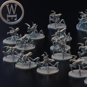 May include: A collection of gray miniature alien creatures, possibly for tabletop gaming. The figures have multiple legs and a detailed, insect-like appearance. Some are on individual bases, others in a group.