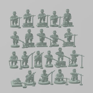 May include: A set of 20 miniature plastic figures of soldiers in a kneeling position, holding rifles and aiming at a target. The figures are painted in a muted green color and are standing on small bases.