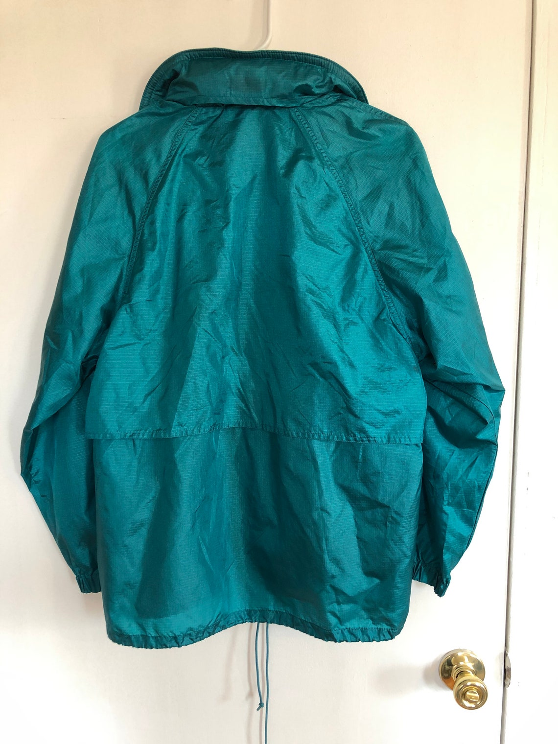 Vintage Eddie Bauer teal rain jacket with retractable hood | Etsy
