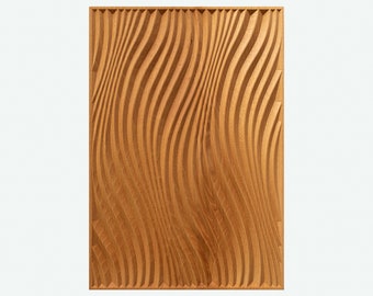May include: A wooden wall panel with a carved pattern of wavy lines. The panel is made of light brown wood and has a natural finish.