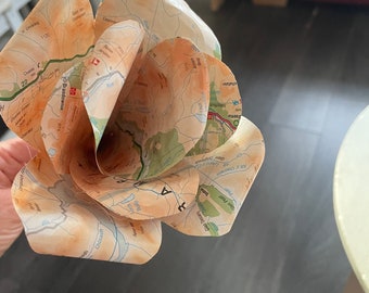 Handmade paper flowers made from maps