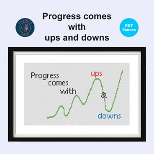 Peut inclure: Un motif de point de croix avec un graphique en ligne verte qui dit "Progress comes with ups & downs". Les mots "ups" et "downs" sont mis en évidence en rouge et en bleu, respectivement. Le motif est encadré en noir.