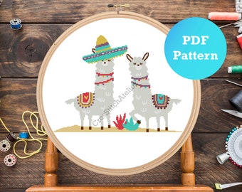 May include: Cross stitch pattern featuring two llamas wearing colorful hats and saddles. The pattern is in a PDF format and is perfect for a beginner cross stitcher.