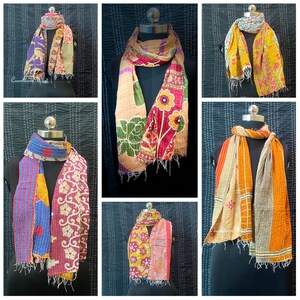 May include: Six different colorful kantha scarves with various patterns and colors. The scarves are made of recycled saris and are perfect for adding a touch of bohemian style to any outfit.