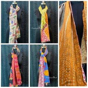 May include: Five different colorful kantha scarves with various patterns and colors. The scarves are made of recycled saris and are perfect for adding a touch of bohemian style to any outfit.