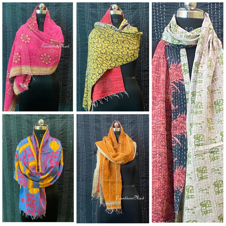 May include: Five different kantha quilts, each with a unique pattern and color combination. The quilts are made of recycled saris and are hand-stitched. The quilts are displayed on mannequins and are folded in a variety of ways. The quilts are all different sizes and shapes. The quilts are all made of cotton and are soft and comfortable. The quilts are perfect for adding a touch of color and style to any room.