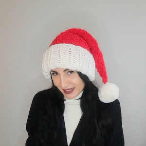 Santa Claus hat. Red cap with white pompon. Stocking cap with Elf. Long red knitted stocking. Chunky hat. A thick warm winter hat  a fleece