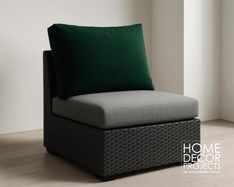 May include: A modern outdoor chair with a dark gray woven base, a light gray seat cushion, and a dark green back cushion. The chair is designed for outdoor use. The text "HOME DECOR PROJECTS" is visible on the right side.