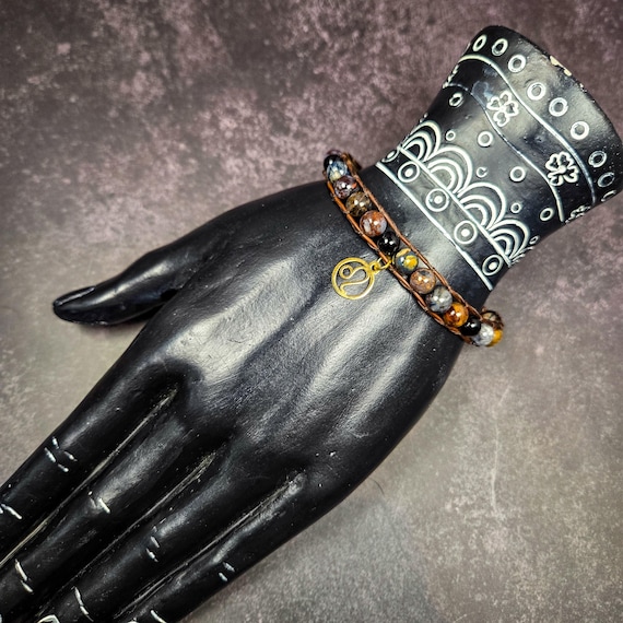 Pietersite and Black Onyx Bracelet with Leo Zodiac Charm: Strength, Courage, and Fiery Determination