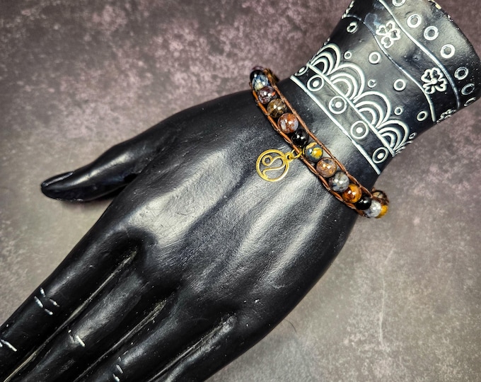 Pietersite and Black Onyx Bracelet with Leo Zodiac Charm: Strength, Courage, and Fiery Determination