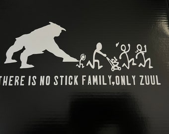 May include: A black and white sticker with a silhouette of a large creature and stick figures of a family. The text reads "THERE IS NO STICK FAMILY, ONLY ZOOUL."