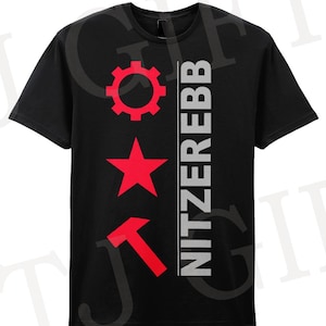 May include: Black t-shirt featuring a red star, hammer and sickle, and a cog. The text "NITZER EBB" is printed vertically on the right side of the shirt.