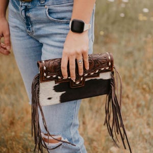 Cartera de mano de cuero de lujo