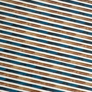May include: A sheet of white paper with a repeating pattern of thin blue and brown stripes. The stripes are arranged in a diagonal pattern.