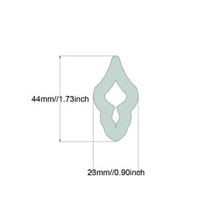 May include: A light green clay sculpting tool shaped like a teardrop with a small hole in the center. The tool is 1.73 inches tall and 0.90 inches wide.