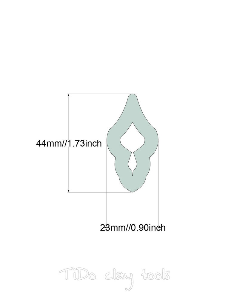 May include: A light green clay sculpting tool shaped like a teardrop with a small hole in the center. The tool is 1.73 inches tall and 0.90 inches wide.