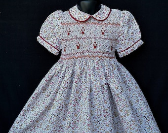 Smocked dress with balloon sleeves and Peter Pan collar in garnet multicolor cotton, 1 year to 12 years
