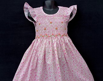 Robe smocks manches volantes en coton liberty rose 1 an à 12 ans