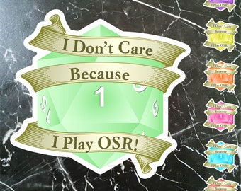 May include: A green 20-sided die with a white "1" on it. The die is surrounded by a gold ribbon with the text "I Don't Care Because I Play OSR!" on it. There are six other versions of the die with different colors in the background.