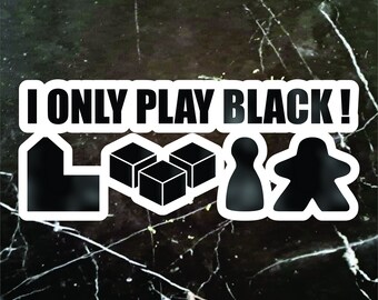 May include: A white sticker with black text that reads "I ONLY PLAY BLACK!" and black icons of a house, three cubes, a pawn, and a game piece.