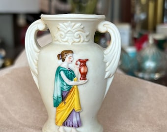 Japan figurine Lady holding Vase