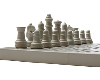 Arena's concrete chess set can start one heavy battle of wits and courage -  Yanko Design