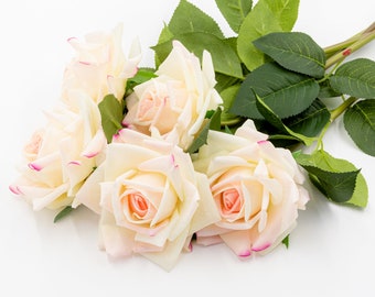 Artificial pink roses with real touch  Roses at the wedding