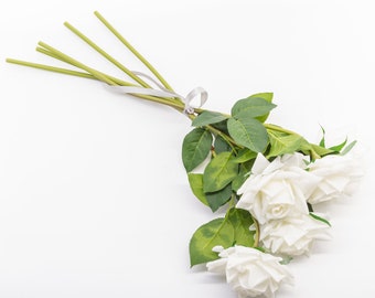 Authentic touch of white artificial roses  Wedding bouquet