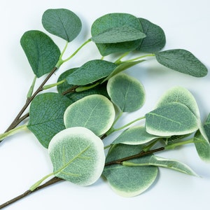 Dusty artificial eucalyptus leaves Wedding arrangements Bridal bouquet