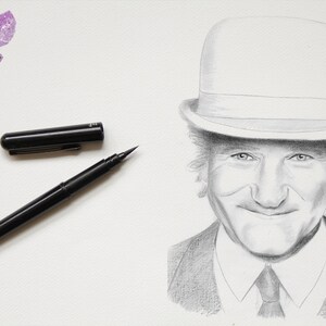 May include: A black and white pencil drawing of a man wearing a hat and a suit. The man is smiling and has a kind expression on his face.