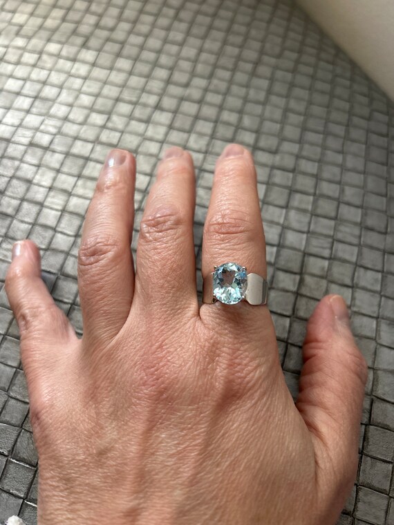 Silver ring with 6 carat blue topaz - image 1