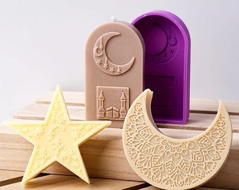 May include: Three silicone candle moulds for making Islamic-themed candles. The moulds are in the shapes of a crescent moon, a star, and a mosque. The crescent moon mould has a detailed mandala design.