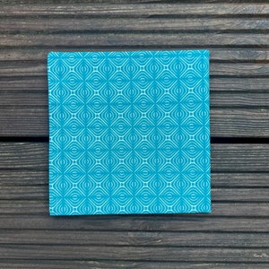 Serviette de table doublée en tissu Kaléidoscope Bleu