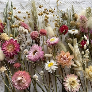 May include: A rustic wooden sign with the text "Welcome to our home" in white lettering. The sign features a distressed finish and a simple, inviting design, perfect for a front porch or entryway.