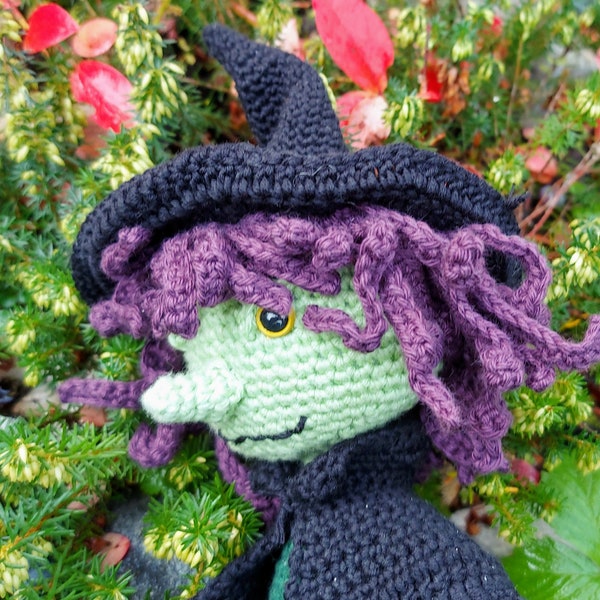 Crochet pattern - Cute green purple-haired Halloween witch with black hat.